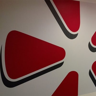 Printed and Installed Yelp Logo Using Dreamscape Suede Wallcovering