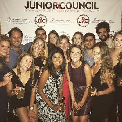 The Junior Council Poses With Their Step and Repeat Banner.