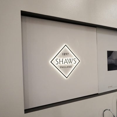 Side View of Retail Backlit Signage Including Changeable Magnetic Wall Graphics