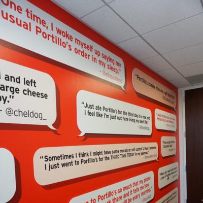 Vertical Image of Portillo's Wall Graphics and Tweets