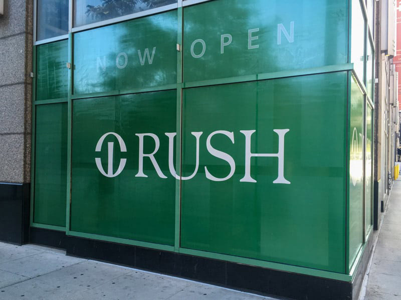 What is the purpose of signage? 6 rush window graphic now open