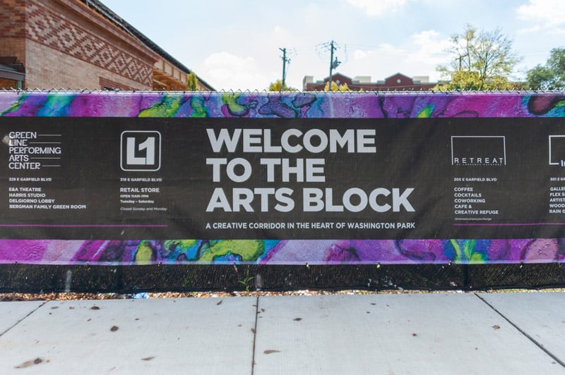 Six reasons to brand your building site 11 arts block signage front view